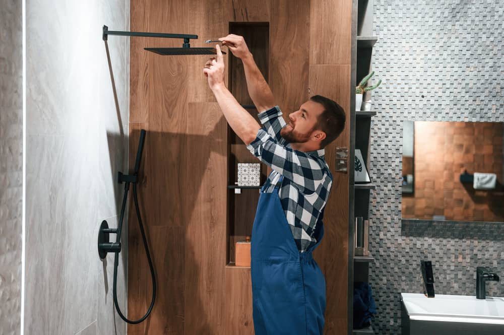 Pro Plumber Installing Luxury Shower